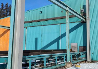 2-Exco placing tall beams at the site