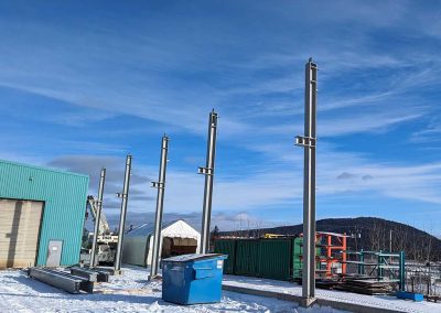 3-Exco placing tall beams at the site
