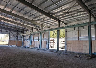 Exco inside the building showing side door
